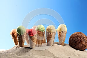 Set of ice cream scoops of different colors and flavours with berries and fruits