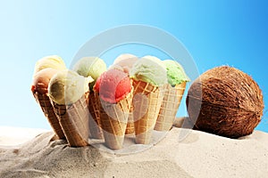 Set of ice cream scoops of different colors and flavours with berries and fruits