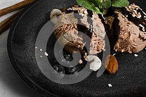 Set of ice cream scoops of different colors and flavours with berries, nuts and fruits