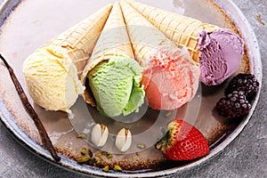 Set of ice cream scoops of different colors and flavours