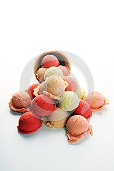 Set of ice cream scoops of different colors and flavours in the summer