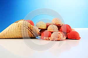 Set of ice cream scoops of different colors and flavours in the summer