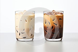 Set of iced black coffee and iced latte with milk in tall glass, isolated on white background