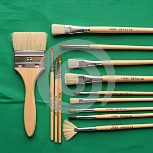 Set includes various sizes and types, such as a wide flat brush