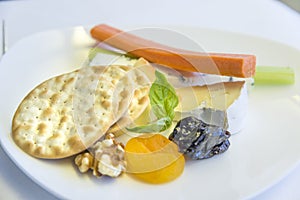 Set inflight meal appetizer on a tray, on a white table