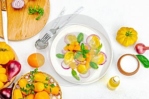 A set of ingredients for preparing a vegetable salad. Fresh and healthy vegetables, herbs, spices