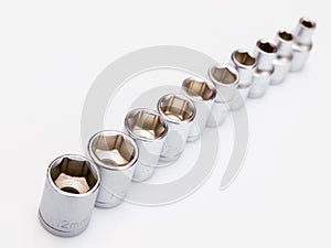 Set of interchangeable heads for chrome socket wrench. Isolated on white background