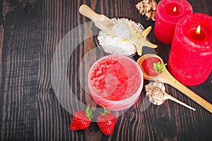 A set of items for spa and body care on a wooden background.