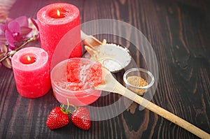 A set of items for spa and body care on a wooden background.