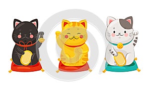 Set of Japanese lucky cat maneki neko. Traditional Japan culture black, gold and white sculptures vector illustration