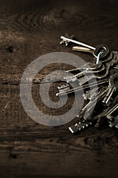 Set of keys on wood background