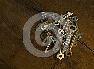 Set of keys on wood background