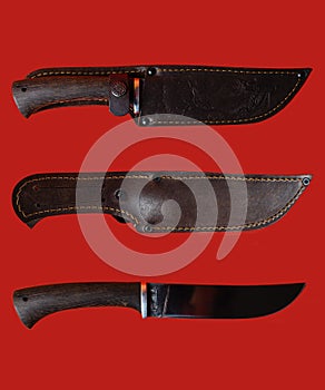 a set of kitchen knives in a leather case on a red background