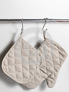 a set of kitchen tacks made of cotton fabric with a loop