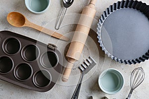 Set of kitchen utensils for bakery on grey background