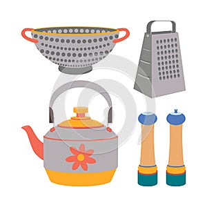 A set of kitchen utensils, a kettle, a colander, grater, salt and pepper shaker