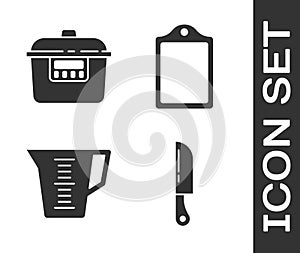 Set Knife, Slow cooker, Measuring cup and Cutting board icon. Vector
