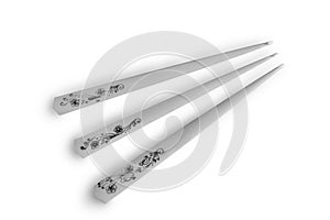 A set of knitting hooks on a white background