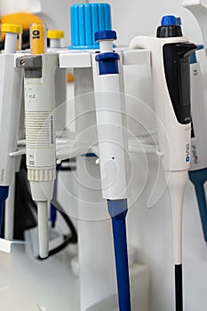 Micropipettes Arranged on a Laboratory Stand