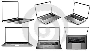 Set of laptops in different positions.