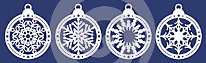 Set of laser cutting template of Christmas balls with snowflakes. Silhouette of openwork spheres with lace ornament. Xmas tree