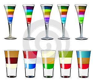 set of layered alcoholic cocktails in different colors on a white background