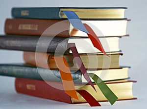 A Set of Leather Bound Books with Bookmarks