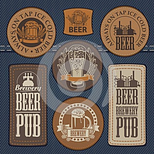 Set of leather labels on denim on the theme pub