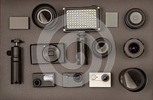 A set of lenses, action-cameras and others photographic equipment photo