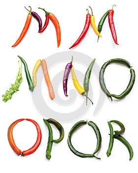 set of letters m n o p q r made from green orange red purple yellow chili pepper and celery plant stick