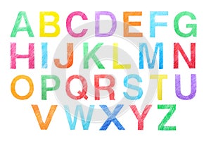 Set of letters written with color pencils on background, top view