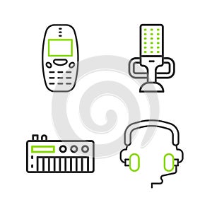 Set line Headphones, Music synthesizer, Microphone and Old mobile icon. Vector