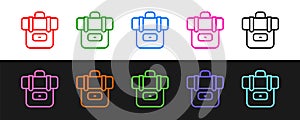 Set line Hiking backpack icon isolated on black and white background. Camping and mountain exploring backpack. Vector