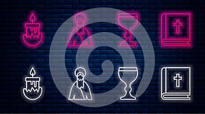 Set line Jesus Christ, Wine glass, Burning candle and Holy bible book. Glowing neon icon on brick wall. Vector