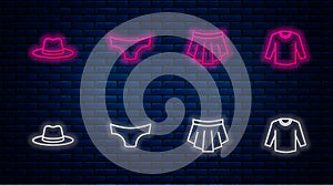 Set line Men underpants, Skirt, Man hat and Sweater. Glowing neon icon on brick wall. Vector