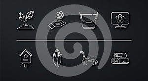 Set line Plant, Bird house, Location with flower, Lawn mower, Corn, Hand holding, Wooden logs and Bucket icon. Vector