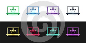 Set line Shopping basket on screen laptop icon isolated on black and white background. Concept e-commerce, e-business