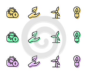 Set line Wind turbine, Water mill, Leaf hand and Light bulb with leaf icon. Vector