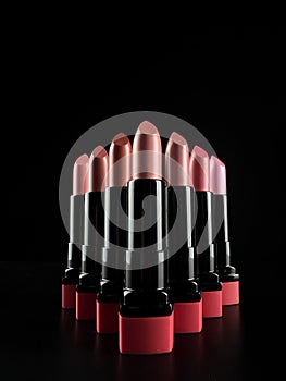 A set of lipsticks on a black background. makeup artist content.