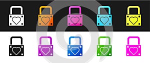 Set Lock and heart icon isolated on black and white background. Locked Heart. Love symbol and keyhole sign. Valentines