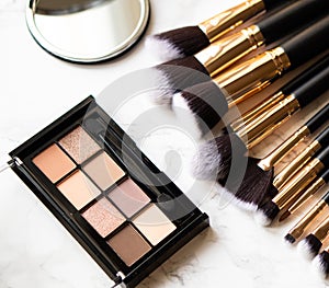 Set of luxurious black makeup brushes close-up