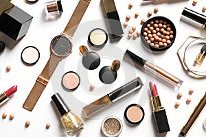 Set of luxury makeup products on white background