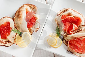 Set of luxury pancakes with seafood top view