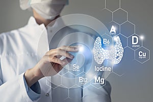 Set of main human organs with molecular grid, micronutrients and vitamins with doctor on blurry blue background. Thyroid Gland