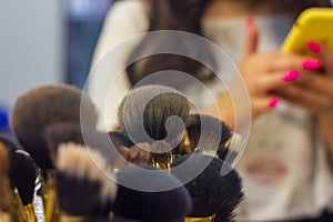 Set of make up artists brushes on the table