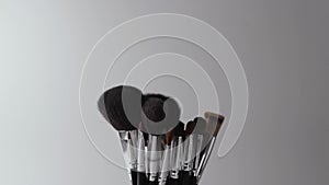 Set of make up brushes in rotation