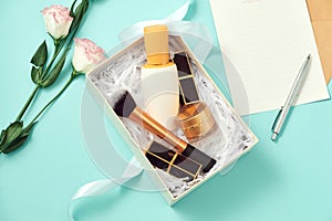 Set of make up cosmetics isolated on blue background