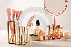 Set of makeup products and brushes