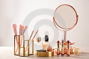 Set of makeup products and brushes