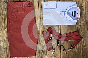 Set of man casual clothes on wooden table